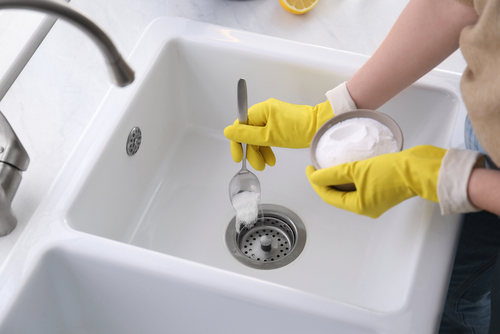 How do you deep clean a kitchen sink drain